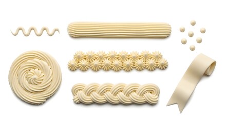 Various piped buttercream frosting patterns, borders, swirls, and ribbons isolated on white background