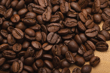 Coffee beans close-up , Roasted coffee beans on bamboo cutting plate , Can be used as a background