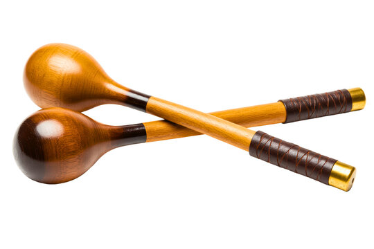Pair of wooden maracas with leather-wrapped handles isolated with transparent background isolated on a transparent background