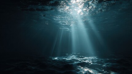 Underwater scene with rays of light piercing through dark water, creating a tranquil atmosphere in the ocean depths