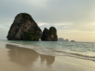 Coastal Landscape with Rocks and Mountain View