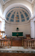 Traditional Church Altar and Sanctuary with Crucifix Under an Arched Apse and Marble Railing, St Laurence Church, Petersfield, Hampshire