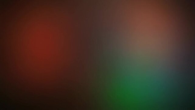 abstract clowing background with multicolored blurred gradients moving on dark
