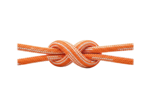 Isolated orange rope is tied in an overhand knot, a simple binding knot for fastening ropes