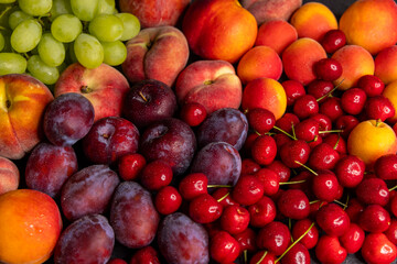 Fresh summer fruit abundance forming color gradient