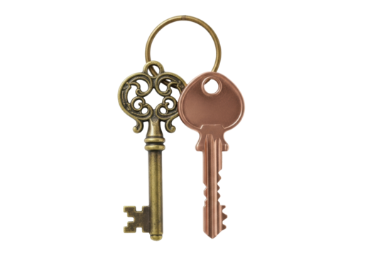 Isolated pair of antique and modern keys hanging on a metal ring ready to use access