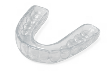 Transparent dental bruxism night guard for teeth protection and alignment, orthotic mouthpiece on transparent background