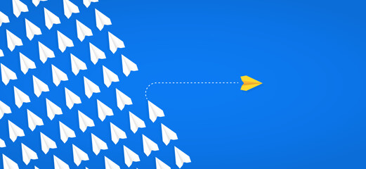 Yellow paper plane taking a different path while white planes follow, symbolizing thinking differently, changing paths, and embracing new directions