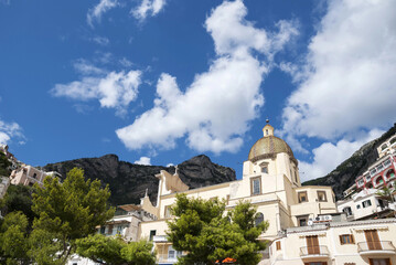 View of the Church of Santa Maria Assunta in Positano, on the Amalfi Coast, capturing its iconic beauty on a bright sunny day