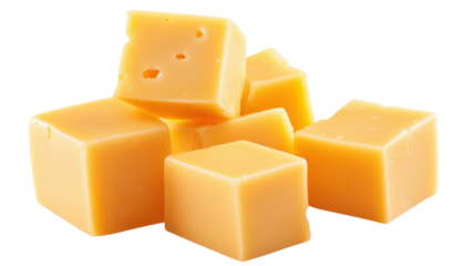 Cheddar cheese cubes are stacked, displaying their vibrant orange color and smooth texture for snacking or cooking.