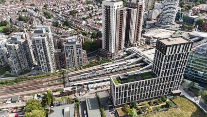 Train aproching station Croydon town centre south London UK drone,aerial © Air Video UK 