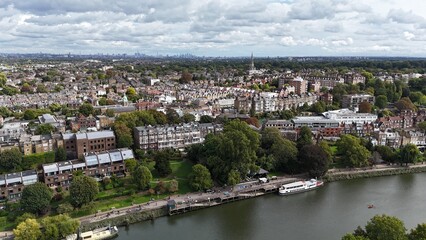 Obraz premium Thames riverside Richmond London UK houses and streets drone,aerial