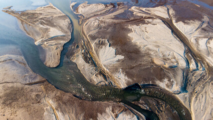 Aerial view of natural river delta patterns.