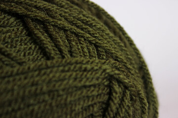 Extreme close-up of twisted yarn strands showing rich texture and fiber detail.