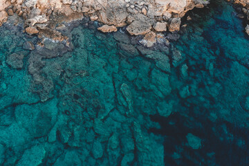 Birdview of mediterranean sea water of a lovely coastline- Mallorca best beaches	

