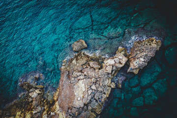 Waves crash against the rocks on the Mediterranean coast Mediterraneo Islas Baleares