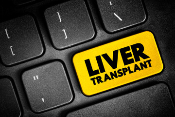 Naklejka premium Liver Transplant is surgery to remove your diseased or injured liver and replace it with a healthy liver from another person, text button on keyboard, concept background