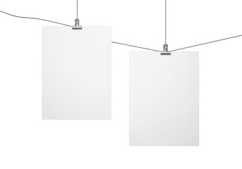 Two blank white paper rectangles hanging on a string isolated on transparent background