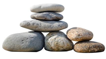 Stacked smooth pebbles arranged in a balanced formation over a white background for decorative purposes.