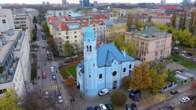 4K cinematic drone footage of the Blue Church in Bratislava, highlighting the building&rsquo;s distinctive blue colors, decorative mosaics, and curved architectural shapes in the heart of Bratislava._04