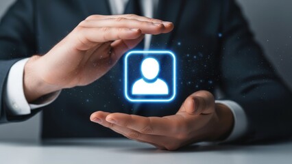Businessman hands holding glowing user profile icon digitally