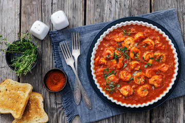 Shrimp in hot tomato sauce with garlic, onion