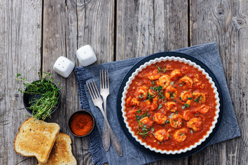 Shrimp in hot tomato sauce with garlic, onion
