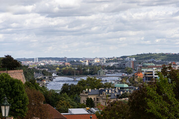 Fototapeta premium Prague cityscape. View of the city and river Vltava from above. Prague, Czech Republic.