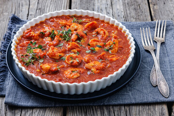 Shrimp in hot tomato sauce with garlic, onion