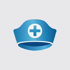 Fototapeta premium Blue Nurse Hat with White Cross Symbol for Healthcare.
