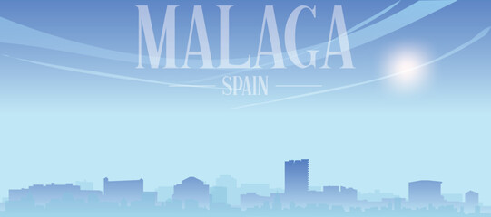 Naklejka premium Blue panoramic poster of the city skyline with misty background buildings and clouds of MALAGA, SPAIN