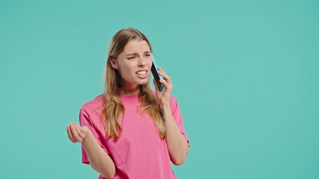 Annoyed Outraged Blonde Woman Quarreling Talking On Mobile Phone. Angry Lady 