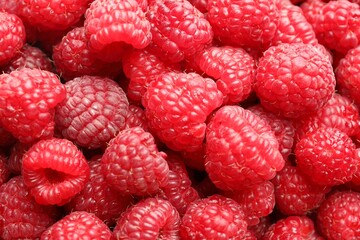 Fresh ripe raspberries as background, top view