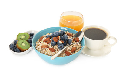 Tasty breakfast. Oat flakes with almonds, fruits, coffee and orange juice isolated on white