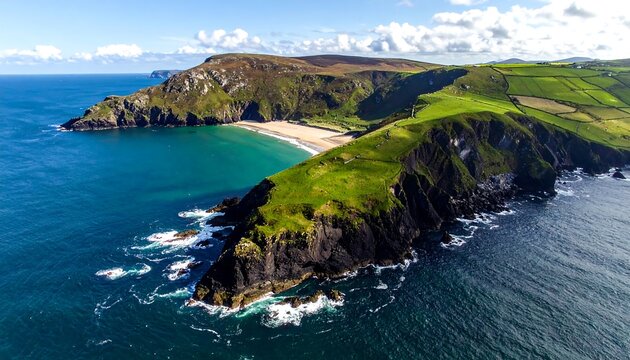 Aerial view of rugged Irish coastline featuring green cliffs, sandy beach, and turquoise ocean under a partly cloudy sky - Powered by Adobe