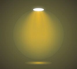 Yellow spotlight shining on dark background