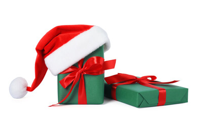 Santa hat and gift boxes isolated on white. Merry Christmas and Happy New Year