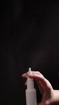 The video highlights the process of spraying a vasoconstrictor, addressing the health implications of excessive use and potential addiction.