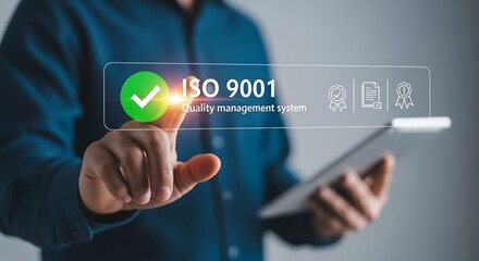 Professional interacting with a digital interface for successful quality management system certification and compliance