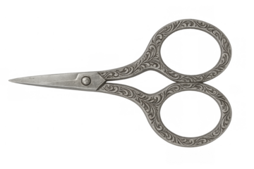 Vintage ornate embroidery scissors with detailed filigree patterns, a decorative metal tool for sewing and craft projects, transparent background