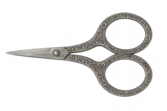 Vintage ornate embroidery scissors with detailed filigree patterns, a decorative metal tool for sewing and craft projects, transparent background