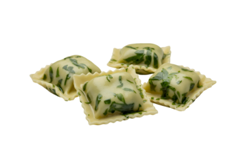 Four square spinach ricotta ravioli isolated on transparent background