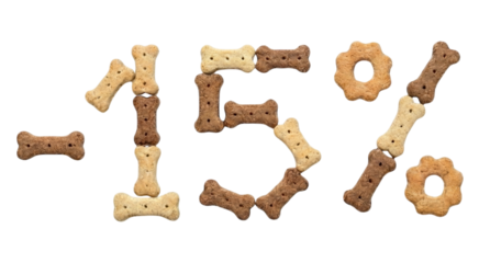 Rawhide dog chew bones arranged in -15% sale sign isolated