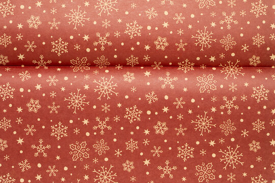 red christmas background with snowflakes and stars and dots,seamless pattern of snowflakes and stars on red background,Christmas wrapping paper, Xmas pattern with ornaments.