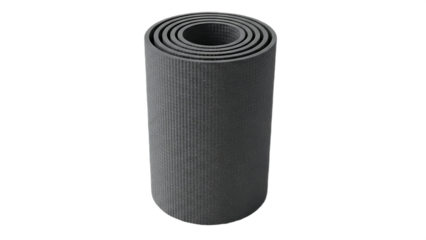A rolled up gray yoga mat with a textured surface isolated against a black background in studio light
