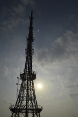 cell phone tower at sunset