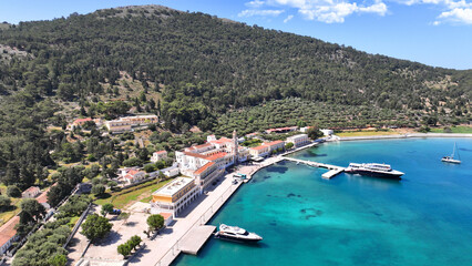 Aerial drone photo of iconic bay and holy Monastery of Archangel Michael Panormitis, Symi island,...