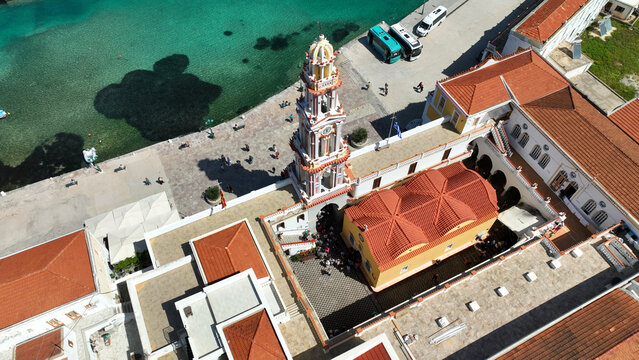 Aerial drone photo of iconic bay and holy Monastery of Archangel Michael Panormitis, Symi island, Dodecanese, Greece