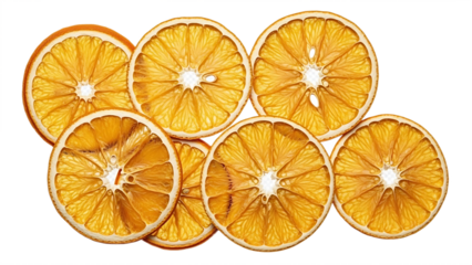A close up of several dried orange slices arranged on a black background in a studio setting