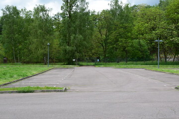 big empty parking lot in spring